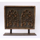 AN INDIAN CARVED WOODEN PRINTING BLOCK