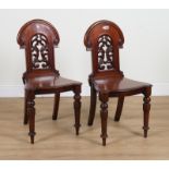 A PAIR OF EARLY VICTORIAN MAHOGANY HALL CHAIRS (2)