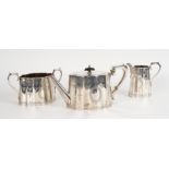 A VICTORIAN SILVER MATCHED THREE PIECE TEA SET