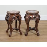 A PAIR OF LATE 19TH CENTURY CHINESE EXPORT CARVED HARDWOOD JARDINIERE STANDS (2)