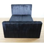 A NAVY BLUE VELVET UPHOLSTERED BED HEADBOARD AND FOOTBOARD