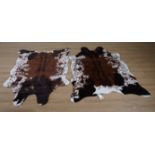 ‘INSPIRED IVORY’ TWO FAUX COW SKIN RUGS (2)