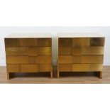 A PAIR OF MODERN CREAM LACQUERED BRASS FRONTED CHESTS OF DRAWERS (2)