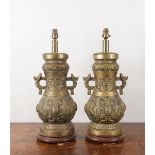 A PAIR OF CHINESE ARCHAIC STYLE METAL VASE TABLE LAMPS (2)