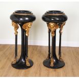 A PAIR OF GILT COMPOSITION BLACK MARBLE FLOOR-STANDING URNS OR JARDINIÈRES (2)