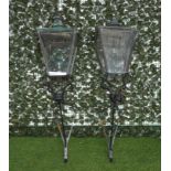 A PAIR OF VICTORIAN STYLE COPPER AND IRON GAS LANTERNS ON BRACKETS (2)