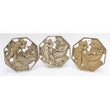 THREE METAL ALLOY RELIEF CAST OCTAGONAL PANELS DEPICTING A SATYR AND A NYMPH (3)