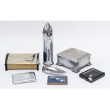 A CHROME PLATED BULLET SHAPED TABLE LIGHTER (7)