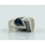 A SAPPHIRE AND DIAMOND ABSTRACT RING