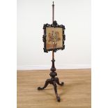 AN EARLY VICTORIAN MAHOGANY POLE SCREEN