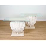 A PAIR OF CONSOLE TABLES WITH GLASS TOPS AND SCALLOP SHELL BASES (2)