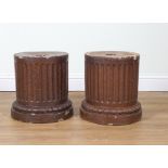 A PAIR OF SALT-GLAZED EARTHENWARE FLUTED COLUMN PEDESTALS (2)