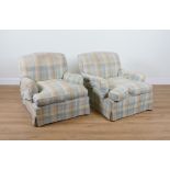 HOWARD & SON; A PAIR OF EARLY 20TH CENTURY EASY ARMCHAIRS (2)