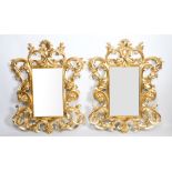 CHRISTOPHER GUY; A PAIR OF GILT DECORATION RECTANGULAR WALL MIRRORS (2)