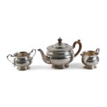 A SILVER THREE PIECE TEA SET