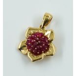 A GOLD RUBY PENDANT