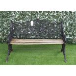 AN EARLY 20TH CENTURY BLACK PAINTED CAST IRON BENCH