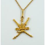 A GOLD MILITARY PENDANT