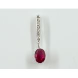 A WHITE GOLD, RUBY AND DIAMOND PENDANT