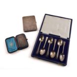 A SILVER CIGARETTE CASE, SIX TEASPOONS AND A VISITING CARD CASE (8)