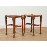 A PAIR OF 19TH CENTURY ASH FRAMED RUSH SEAT STOOLS (2)