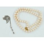 A DIAMOND DROP NECKLACE AND A PEARL NECKLACE (2)