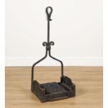 AN EARLY 20TH CENTURY WROUGHT IRON BOOTSCRAPER