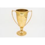 A 9CT GOLD CORONATION CUP EPSOM TWIN HANDLED TROPHY CUP