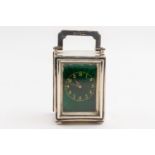 A SILVER AND GREEN ENAMELLED TRAVELLING CARRIAGE CLOCK TIMEPIECE