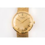 A LONGINES 14CT GOLD WATCH