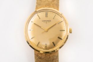 A LONGINES 14CT GOLD WATCH