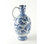 AN ARITA BLUE AND WHITE EWER