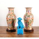 A PAIR OF CHINESE SALMON PINK GROUND BALUSTER VASES AND A TURQUOISE GLAZED BUDDHIST LION (3)