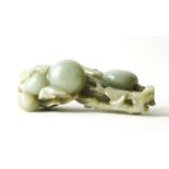 A LARGE CHINESE JADE GROUP OF GOURDS