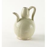 A CHINESE POTTERY EWER