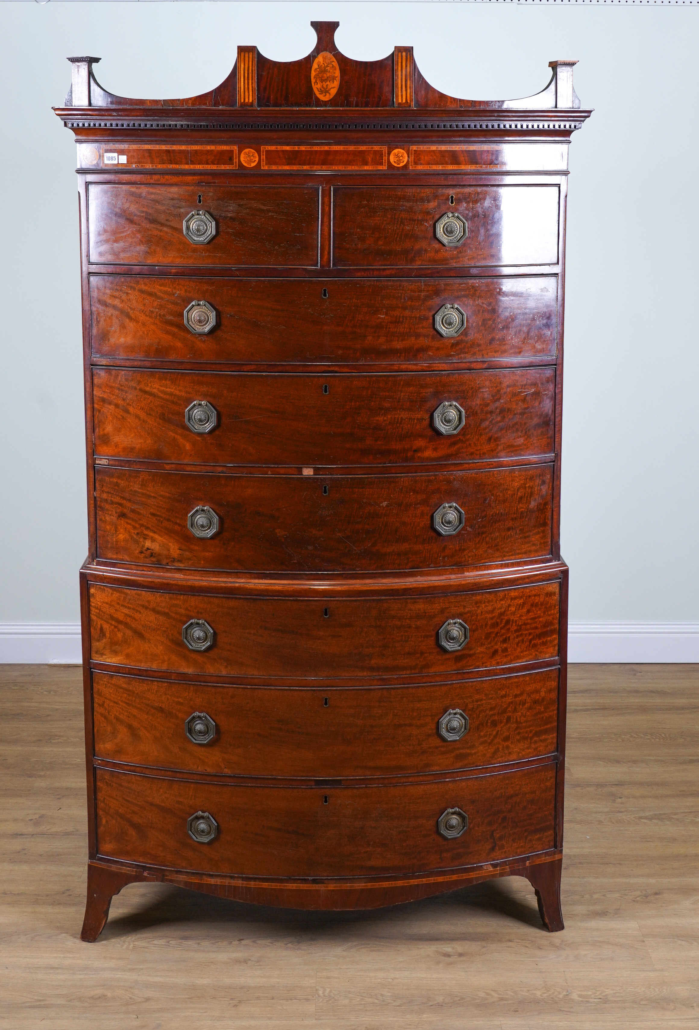 A GEORGE III MAHOGANY BOWFRONT EIGHT DRAWER CHEST ON CHEST