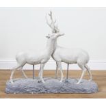 A PAINTED PLASTER MODEL OF TWO STAGS