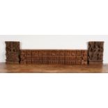 AN INDIAN CARVED WOOD FRIEZE PANEL OR ELONGATED WALL POCKET, TOGETHER WTH A TWO SIMILAR...