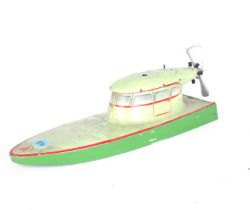 A MID 20TH CENTURY FRENCH TIN MODEL OF A PROPELLOR BOAT