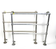 A PAIR OF EARLY 20TH CENTURY CHROME DECO HEATED TOWEL RAILS