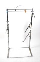 AN ART DECO CHROME ADJUSTABLE THREE TIER SHELF STAND