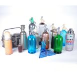 A GROUP OF 20TH CENTURY SODA SYPHONS AND FLASKS