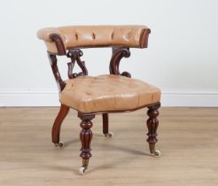A VICTORIAN MAHOGANY FRAMED LEATHER UPHOLSTERED DESK CHAIR