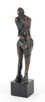 CLIFFORD CUNDY (BRITISH 1926-1992): A GREEN AND BLACK PATINATED BRONZE FIGURE