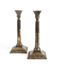 A PAIR OF SILVER TABLE CANDLESTICKS