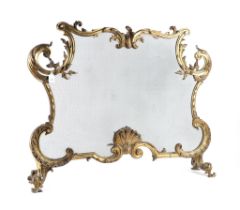 A LOUIS XV STYLE GILT-BRASS CARTOUCHE SHAPED FIRE SCREEN