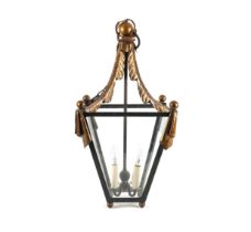 A FRENCH GILT AND BLACK DECORATED IRON LANTERN