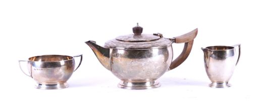 A SILVER THREE PIECE TEA SET