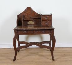 LIBERTY & CO LONDON; AN ARTS AND CRAFT JAPANESE CARVED WRITING DESK
