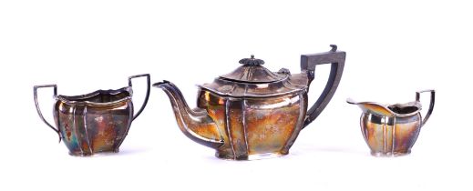 A SILVER THREE PIECE TEA SET